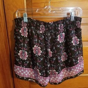 Maurices black floral shorts.  Size L